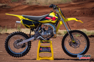 Yellow dirt bike parked stand - art free wallpaper