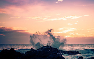 Wave rocks ocean sunset pink - a pink sky in the background free wallpaper for desktop