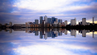 City skyline reflection lake sunset - symmetric free wallpaper