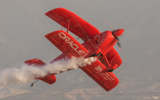 Red plane smoke wings mountains - ann thetis blacker free wallpaper