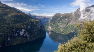 Mountain lake clouds blue sky - white cloud free wallpaper