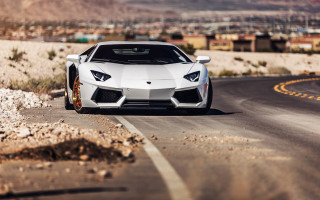 White sports car desert mountains 2 - a road in the desert free wallpaper