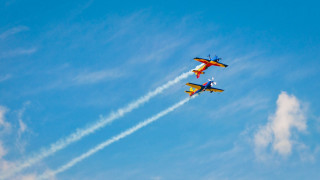 Airplanes smoke trailing sky clouds - smoke behind them free wallpaper