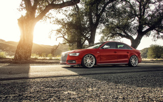 Red car parked trees hill - tree and a hill in the background free wallpaper