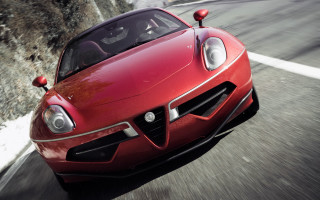 Red sports car mountain side - alesso baldovinetti free wallpaper