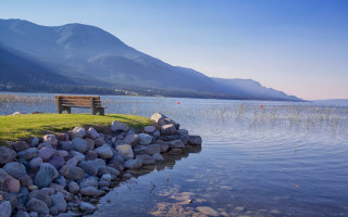 Lake mountains bench rock wall - the background and grass free wallpaper for desktop
