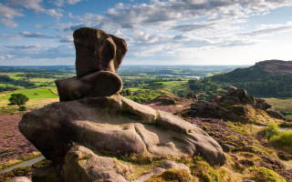 Rock formation valley horizon sky - a rock formation free wallpaper