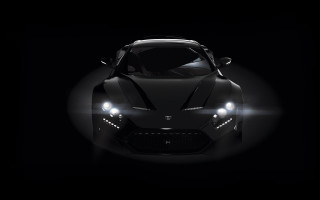 Black sports car headlights on - a spotlight free wallpaper