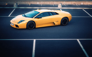 Yellow sports car tiltshift sharplines - a parking lot free wallpaper