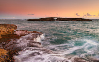 Rocky cliff water outcropping beach 3 - a rocky cliff free wallpaper