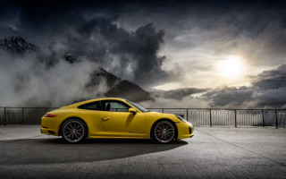 Yellow sports car mountain cloudy - cinematic photography free wallpaper for desktop