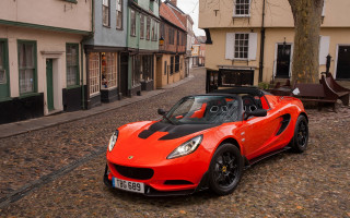 Red sports car cobblestone town - a cobblestone street free wallpaper for desktop