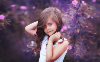 Young girl purple background flowers - a childs free wallpaper