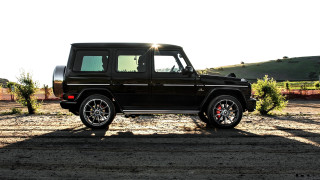 Black suv dirt lot forest - a black suv free wallpaper