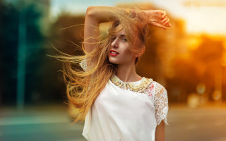 Blonde woman windy street fashion - a street corner free wallpaper