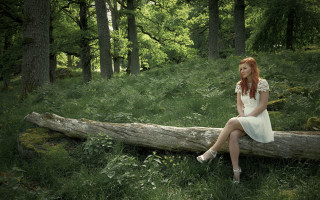 Woman forest sitting moss dress - in a forest free wallpaper