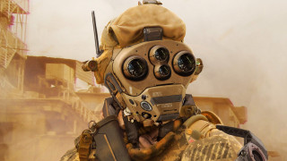 Man gasmask gun automatistes cyborg - a man in a gas mask holding free wallpaper