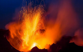 Firework mountain night sky embers - a microscopic photo free wallpaper