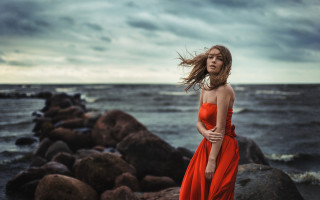 Woman red dress ocean rocks - artur tarnowski free wallpaper