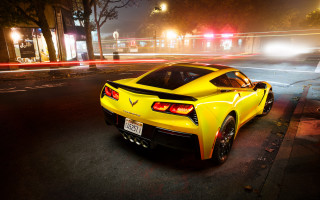 Yellow sports car night red - a red light in the background free wallpaper