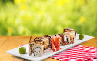 Sushi plate outdoor food photorealistic - a plate of sushi free wallpaper