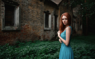 Woman blue dress brick building 2 - a brick building free wallpaper