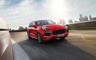 Red porsche cayenne city street - a city street free wallpaper for desktop