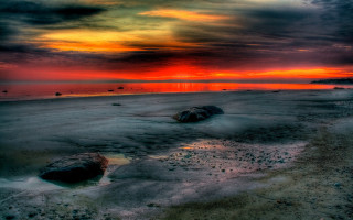 Mystical beach sunset rocks water - the sand and water free wallpaper