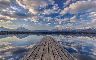 Dock lake mountains cloudy sky - perfect symmetry free wallpaper for desktop