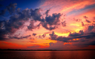 Sunset clouds boat water horizon 2 - a sunset free wallpaper for desktop