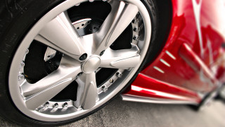 Red sports car wheel tire - photorealism free wallpaper for desktop