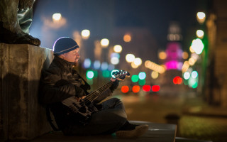 Man sitting ledge bass guitar - derek zabrocki free wallpaper