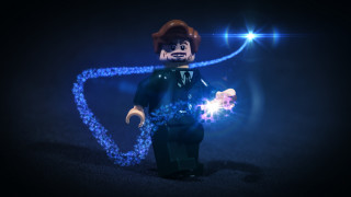Lego man holding lights glowing - anamorphic len free wallpaper for desktop