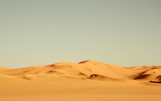 Sand dunes plane desert sky - single free wallpaper for desktop