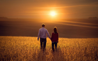 Romantic sunset man woman field - david garner free wallpaper