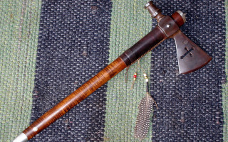 Wooden pipe feather quill rug - a rug free wallpaper