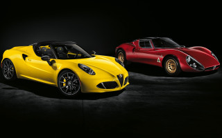Two sports cars black background - bold shape free wallpaper