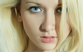 Woman nosepiercing blueeyes serious photorealistic - a ring free wallpaper