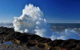 Stormy ocean wave crash rocks - against the rock free wallpaper