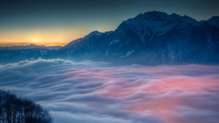 Mountain clouds sunset pink foreground - volumetric fog free wallpaper