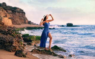 Woman blue dress rock ocean 2 - a blue dress free wallpaper