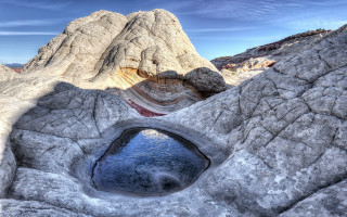 Mountain lake rock formation sky - a rock formation in the background free wallpaper
