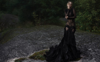 Woman blackdress forest rock mouthing - her mouth and a cigarette free wallpaper