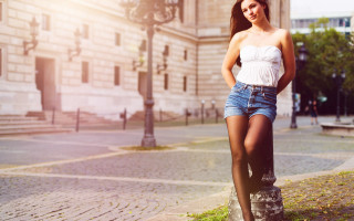 Woman denim shorts clocktower cityscape - a clock tower free wallpaper