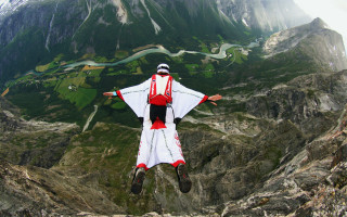 Flying person white red mountain - zenith view free wallpaper for desktop
