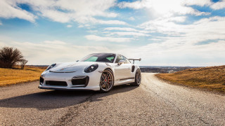 White sports car country road - pearlescent free wallpaper