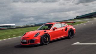 Red sports car race track 6 - a green grass field free wallpaper for desktop