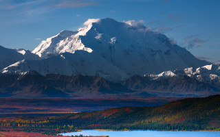 Mountain lake forest sky horizon - a lake in the foreground and a forest in the background free wallpaper