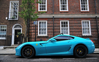 Blue sports car tokyo city - the side of the road in front free wallpaper