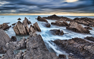 Rocky beach water clouds birds - a bunch of rocks free wallpaper